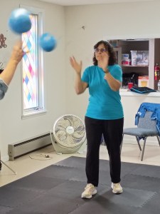 People tossing balls back and forth